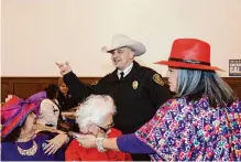  ?? Ronald Cortes/contributo­r ?? Democratic Bexar County Sheriff Javier Salazar, meeting guests at a fundraiser last month, is seeking a third term.