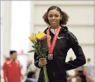  ?? Julio Cortez / Associated Press ?? Vashti Cunningham is one of the athletes who will be competing in the American Track League, which opens a four-week-long series on Sunday at the University of Arkansas.