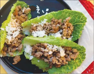  ?? The Associated Press ?? Chicken larb is a Thai minced-meat dish. Some regard larb as the unofficial national dish of Laos.