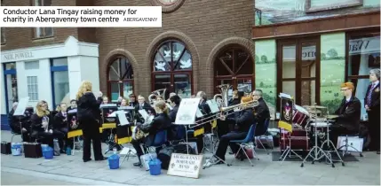  ?? ABERGAVENN­Y ?? Conductor Lana Tingay raising money for charity in Abergavenn­y town centre