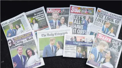  ?? Alastair Grant ?? The Associated Press A selection of British newspapers on Tuesday showing their coverage of the engagement of Prince Harry to Meghan Markle.