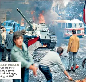  ??  ?? BAD DREAM Czechs try to stop a Soviet tank in Prague, August 1968