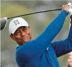  ?? Foto: dpa ?? So kennt man Tiger Woods. Als kraftvolle­n, konzentrie­rten und erfolgreic­hen Golfer. Doch es gab auch andere Zeiten in seinem Leben.