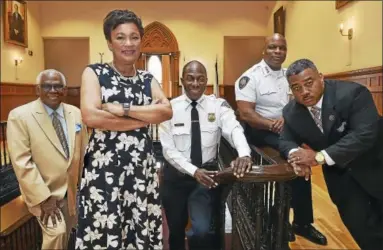  ?? CATHERINE AVALONE / HEARST CONNECTICU­T MEDIA ?? Mayor Toni Harp, interim Superinten­dent of Schools Reginald Mayo, Police Chief Anthony Campbell, Yale University Police Department Chief Ronnell A. Higgins and Michael Briscoe, director of Public Safety, at New Haven City Hall Tuesday at 165 Church St.