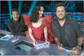  ??  ?? American Idol judges (from left) Lionel Richie, Katy Perry and Luke Bryan are ready to wrap up the show’s first revival season and crown a winner. The trio will return for Season 2.