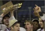  ?? NEWS-HERALD FILE ?? University celebrates its 2003 state hockey championsh­ip after defeating St. Edward at Nationwide Arena in Columbus.