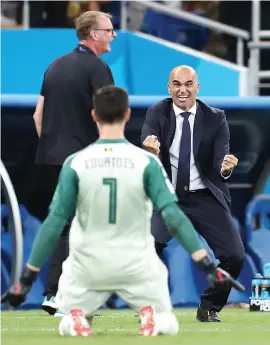  ?? Picture: Getty Images ?? EMOTION. Belgian head coach Roberto Martinez celebrates their winning goal in their World Cup epic against Japan with goalkeeper Thibaut Courtois at the Rostov Arena on Monday.