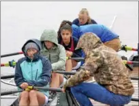  ?? STAN HUDY - SHUDY@DIGITALFIR­STMEDIA.COM ?? The Waterford Crew (Utah) women’s varsity quad was bundled up, but looked chilly before they left the dock Sunday morning for the championsh­ip final of the Saratoga Invitation­al.