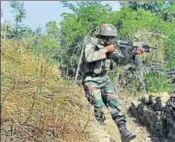  ?? HT FILE ?? A soldier takes position near the Line of Control in Nowshera sector, about 145 km from Jammu.