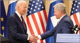  ?? SERGEI GRITS — THE ASSOCIATED PRESS ?? Finnish President Sauli Niinisto, right, praised President Biden for creating unity among the NATO allies. Biden was in Finland to attend the US-Nordic Leaders summit last week.