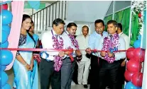  ??  ?? Sabry Ibrahim, CEO/GM, PLC at the inaugurati­on of the relocated People’s Leasing Elpitiya Branch. Also in the picture: Sanjeewa Bandaranay­ake (Senior DGM) and Hasantha de Silva, Chief Manager (Operation) Sampath Hewawasam, Branch Manager, Elpitiya