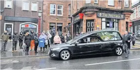  ??  ?? Final farewell Crieff residents came out to pay tribute to Scott Hunter, pictured right