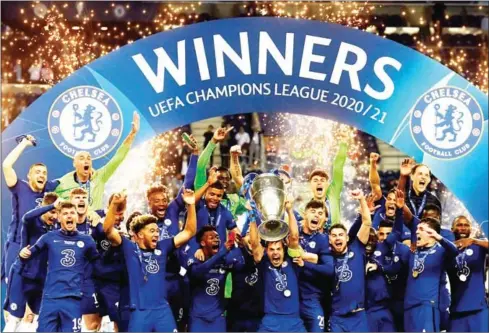  ?? AFP ?? Cesar Azpilicuet­a (centre) and Chelsea’s players celebrate after winning the UEFA Champions League final football match on May 29.