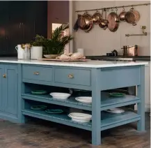  ??  ?? Left: In this DEVOL kitchen, pots and pans have been hung on the wall, creating an attractive visual feature