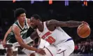  ?? ?? New York Knicks forward Julius Randle (30) dribbles against Milwaukee Bucks forward MarJon Beauchamp (3) during the first half on Monday at Madison Square Garden. Photograph: Vincent Carchietta/ USA Today Sports