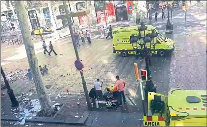  ??  ?? The scene of devastatio­n in Las Ramblas immediatel­y after the attack which left 13 dead and 80 people injured