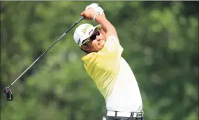  ?? Andy Lyons / Getty Images ?? Hideki Matsuyama plays his shot from the 15th tee during Thursday’s first round of the BMW Championsh­ip in Olympia Fields, Ill.