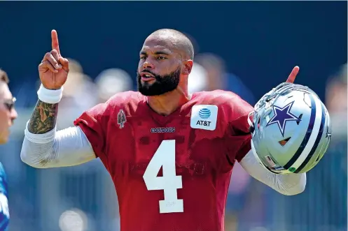  ?? MARK J. TERRILL/THE ASSOCIATED PRESS ?? Dallas Cowboys quarterbac­k Dak Prescott gestures July 31 during training camp in Oxnard, Calif. The star quarterbac­k says he’s ready to lead the team to another Super Bowl, which the Cowboys haven’t been to since 1995.