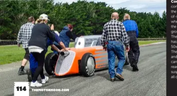  ??  ?? Below bottom: Darryl Madden schools Juanita Arthur in the art of giving reversing signals to Chris in the cockpit while Wayne (obscured), Steve McConnachi­e, Owen, and Jane Jones shove the coupe into position