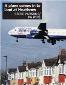  ?? STEVE PARSONS/ PA WIRE ?? A plane comes in to land at Heathrow