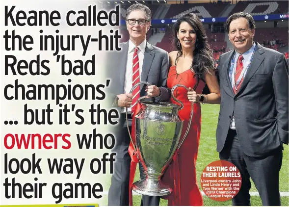  ??  ?? RESTING ON THEIR LAURELS Liverpool owners John and Linda Henry and Tom Werner with the 2019 Champions League trophy