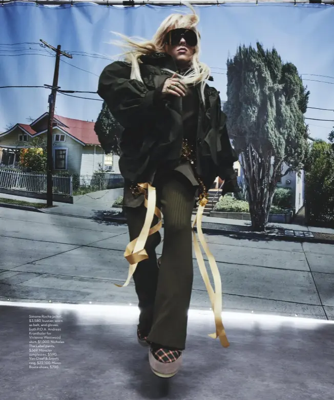  ??  ?? Simone Rocha jacket, $3,580, bustier, worn as belt, and gloves, both P.O.A. Andreas Kronthaler for Vivienne Westwood shirt, $1,000. Nicholas The Label pants, $369. Moncler sunglasses, $590. Van Cleef & Arpels ring, $22,100. Moon Boots shoes, $700.