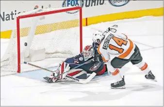  ?? [KYLE ROBERTSON/DISPATCH] ?? Sergei Bobrovsky denies the Flyers’ Sean Couturier during the shootout. The Blue Jackets goalie made 30 saves.