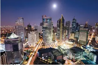  ?? FILE PHOTO ?? RENTAL rates of office spaces in Makati City and other central business districts in Metro Manila continue to rise.