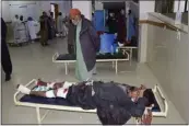  ?? THE ASSOCIATED PRESS ?? Injured victims of a bomb explosion are treated at a hospital in Quetta, Pakistan, last week.