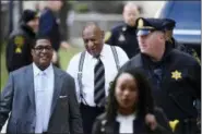  ?? ASSOCIATED PRESS FILE PHOTO ?? Bill Cosby, center, arrives for his sexual assault trial at the Montgomery County Courthouse, Thursday, April 5, 2018, in Norristown.