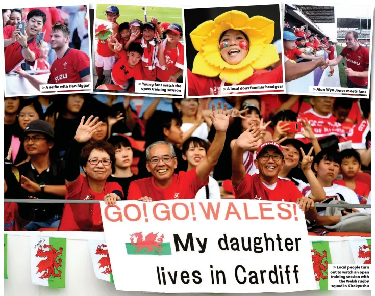  ??  ?? > Local people turn out to watch an open training session with the Welsh rugby squad in Kitakyushu