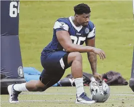  ?? AP PHOTO ?? PUNISHMENT LEVIED: Cowboys defensive lineman David Irving, stretching during this week’s mini-camp in Frisco, Texas, was dealt a four-game suspension for violating the NFL’s substancea­buse policy.