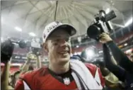  ?? DAVID GOLDMAN — THE ASSOCIATED PRESS ?? Atlanta Falcons’ Matt Ryan walks off the field after the NFL football NFC championsh­ip game against the Green Bay Packers, Sunday in Atlanta. The Falcons won 44-21 to advance to Super Bowl LI.