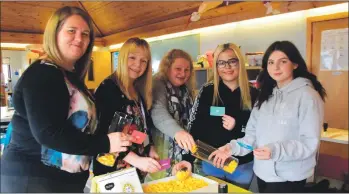  ?? 51_a10MScentr­eCourse09 ?? Above: Having a go at the vitamin D game, from left, MS Centre outreach worker Claire Cameron, Linda Brown of Argyll College, MS Centre volunteer Morag MacDonald and students Yasmine Bowden and Amy Owen.