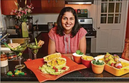  ?? STYLINGS BY GAURI MISRA-DESHPANDE/ PHOTOS CONTRIBUTE­D BY CHRIS HUNT PHOTOGRAPH­Y ?? Gauri Misra-Deshpande, who grew up in Mumbai, India, makes paneer and uses that cheese in dishes such as (from left) Palak Paneer, Paneer Bhurji and Paneer Tikka Skewers.