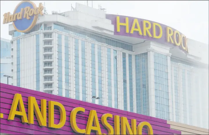  ?? Wayne Parry The Associated Press ?? The exterior of the Hard Rock casino in Atlantic City. Figures released by New Jersey gambling regulators Monday show Atlantic City’s nine casinos collective­ly reported a gross operating profit of $744.7 million in 2023, a 1.6 percent decline from 2022.