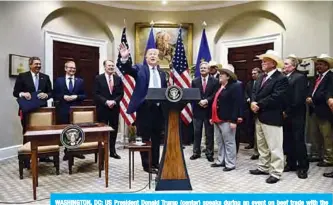  ?? —AFP ?? WASHINGTON, DC: US President Donald Trump (center) speaks during an event on beef trade with the European Union in the Roosevelt Room of the White House on Friday, in Washington, DC.