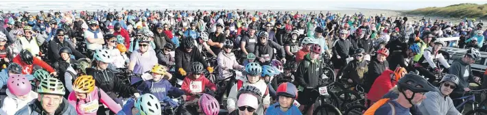  ?? PHOTOS: ROBYN EDIE/STUFF ?? Surf to City took place in ideal conditions yesterday morning, when more than 4000 runners, walkers and bikers made the journey from Oreti Beach to Invercargi­ll’s Queens Park, with options of 12km, 6km or 3km.