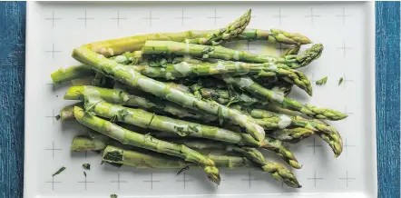  ?? — THE WASHINGTON POST ?? Asparagus with avgolemono sauce: A spring favourite with a versatile sauce.