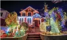  ??  ?? A house is decorated with lights in Dyker Heights on 11 December. ‘It makes you feel like you’re doing something to make everybody happy,’ said Lucy Spata. Photograph: Roy Rochlin/Getty Images