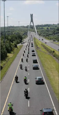  ??  ?? Part of the massive escort for the late Alan Bonner. Photo Paul Woodlock