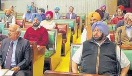  ?? HT PHOTO ?? CM Capt Amarinder Singh (right) and other members in the Vidhan Sabha on Wednesday.