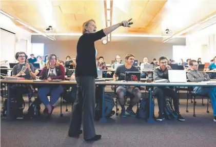  ?? Joe Amon, The Denver Post ?? By Monte Whaley Professor Tracy Camp teaches intro to computer science in Brown Hall at the Colorado School of Mines this month. There are 400 students majoring in computer science at the Golden school.