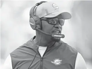  ?? JOHN MCCALL/SUN SENTINEL ?? Dolphins coach Brian Flores watches his team play against the Colts on Oct. 3.