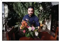  ?? AP file photo ?? Shane Pliska, owner of Planterra, a commercial florist and owner of a wedding venue in West Bloomfield, Mich., had to order flowers from Kenya in September after Hurricane Irma cut off shipments through Miami from South America.