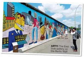  ??  ?? ARTY: The East Side gallery on the Berlin Wall