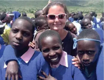  ??  ?? Sgt. Jessica McInnis travelled to Kenya in 2008 with the Free the Children charity to help rebuild a school.