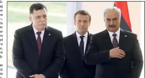  ?? (Photo AFP) ?? Les frères ennemis libyens Fayez al-Sarraj et Khalifa Haftar se sont rencontrés hier en région parisienne, sous l’égide d’Emmanuel Macron.