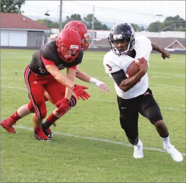  ??  ?? LaFayette senior tailback KaDarrin Ramsey tries to turn the corner against LFO during last week's scrimmage in Fort Oglethorpe. The Ramblers open their regular season on Friday with a non-region game at Armuchee. (Messenger photo/Scott Herpst)