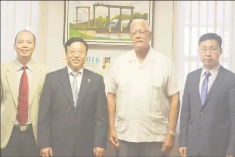  ??  ?? Minister of Agricultur­e Noel Holder (second from right) with new Chinese Ambassador to Guyana, Cui Jianchun (third from left) and Political Counsellor, Yang Chengi (left) and Commercial Counsellor, Shen Hui Yong. (Ministry of Agricultur­e photo)